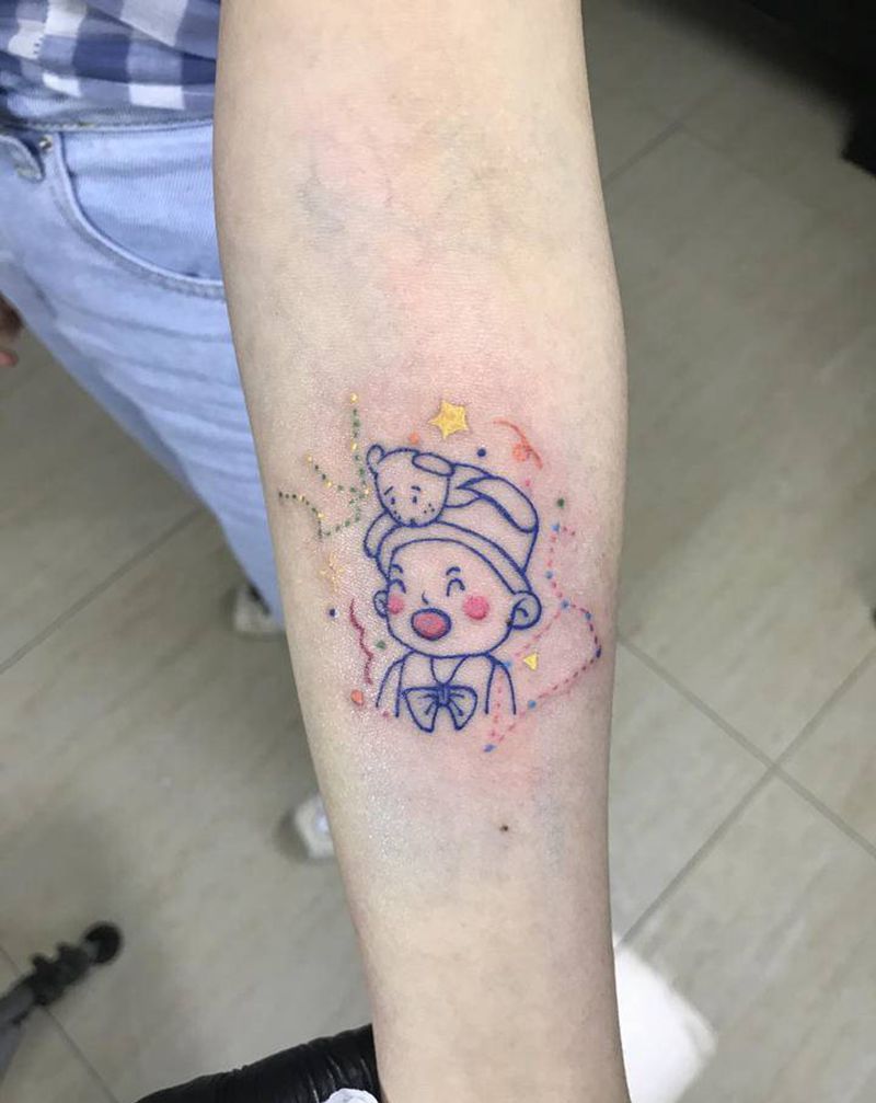 卡通人物肖像纹身图片_手臂卡通纹身图案