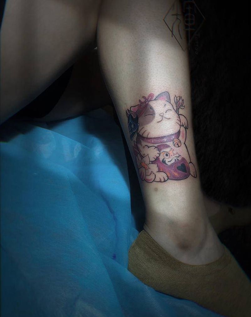 招财喵纹身图片_腿部纹身图案