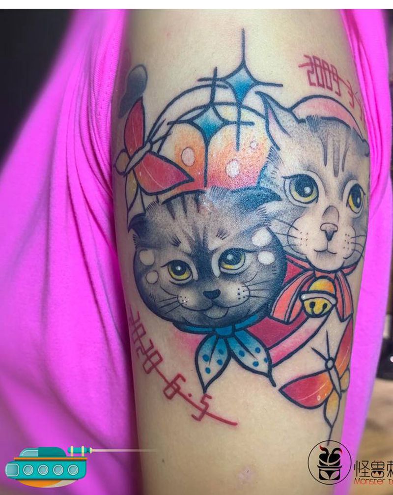 猫咪纹身纹身图片_手臂卡通风格纹身图案