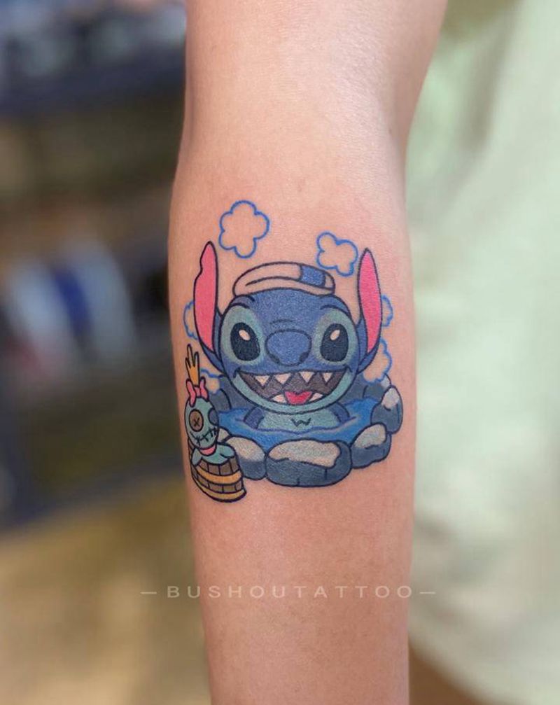 卡通史迪仔纹身图片_手臂Old School史迪仔纹身图案