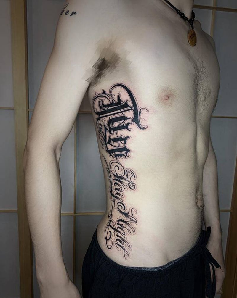 fate花体字纹身图片_腰部花体字fate侧腰字母纹身图案