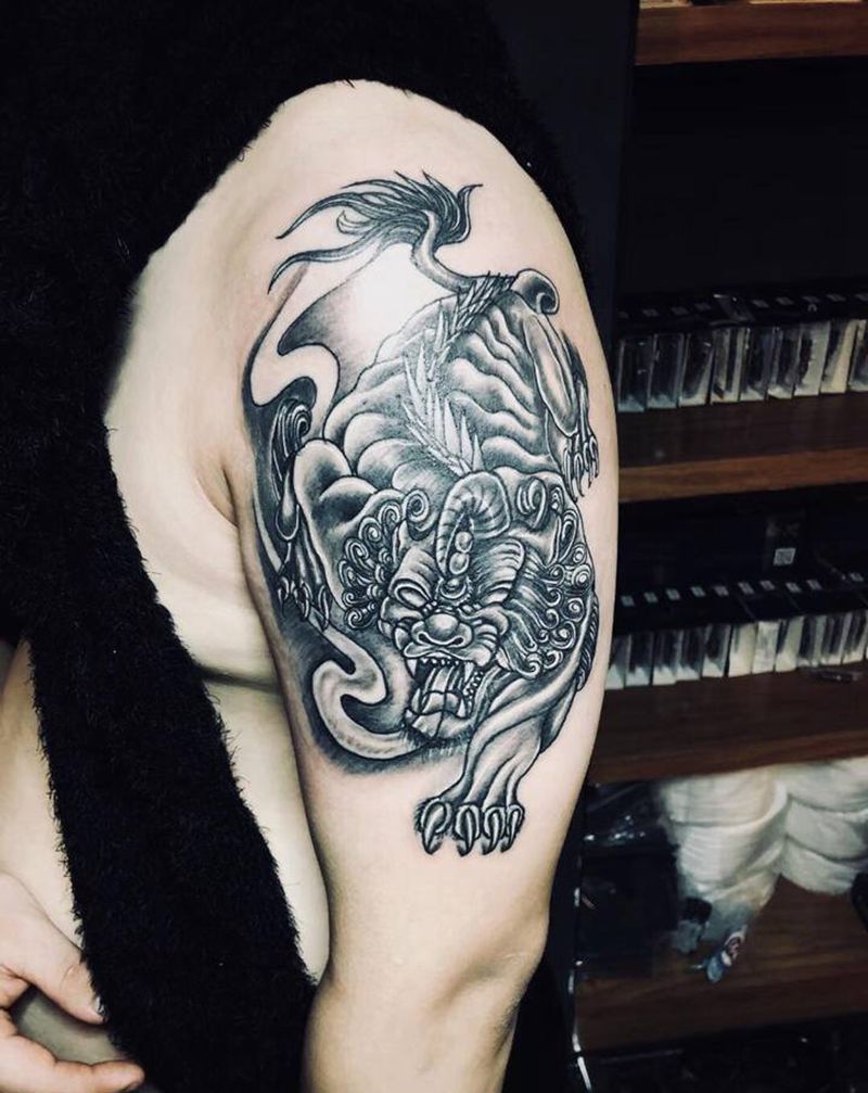 唐狮纹身图片_手臂老传统纹身图案