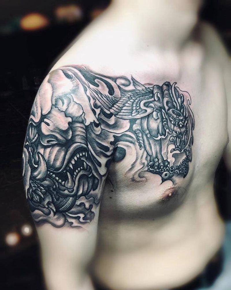 唐狮接貔貅纹身图片_肩部手臂老传统纹身图案