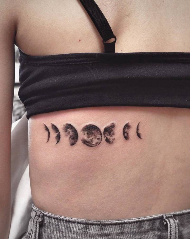 月纹身图片_背部点刺欧美写实月食纹身图案