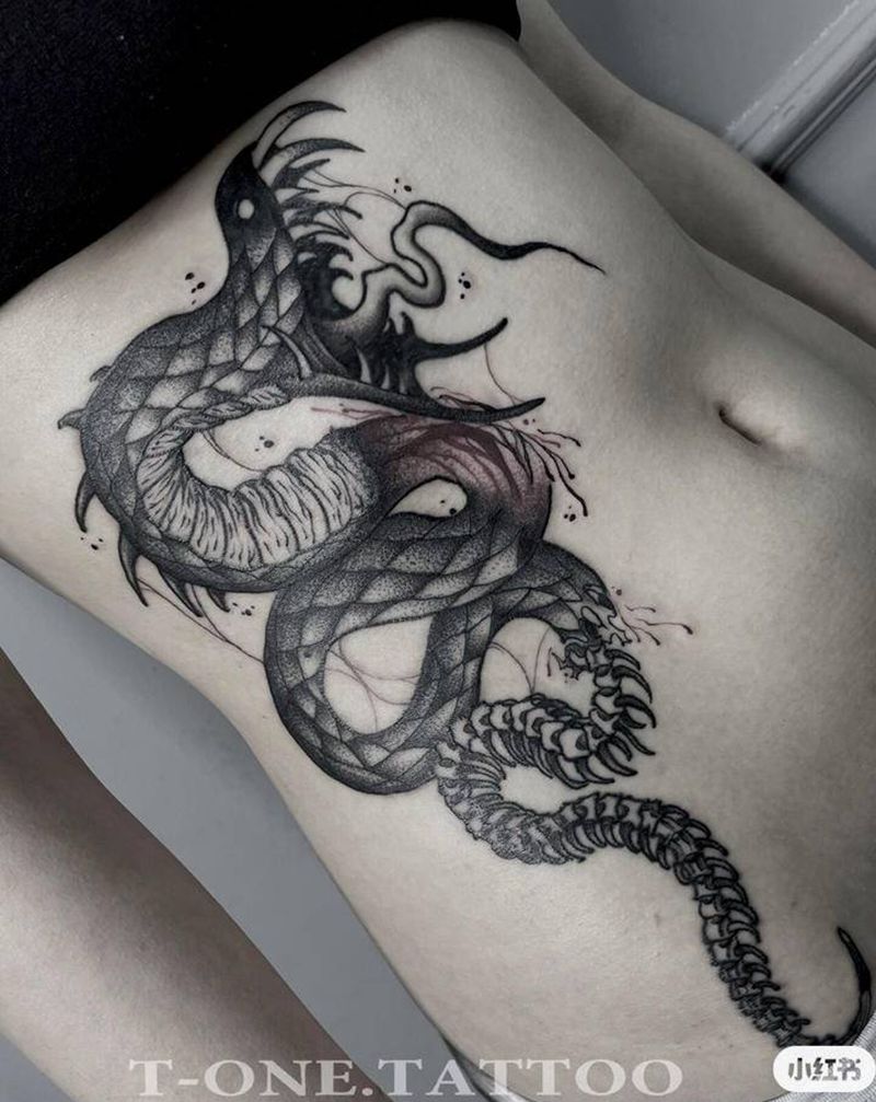 T-one纹身图片_腰部欧美写实暗黑纹身图案