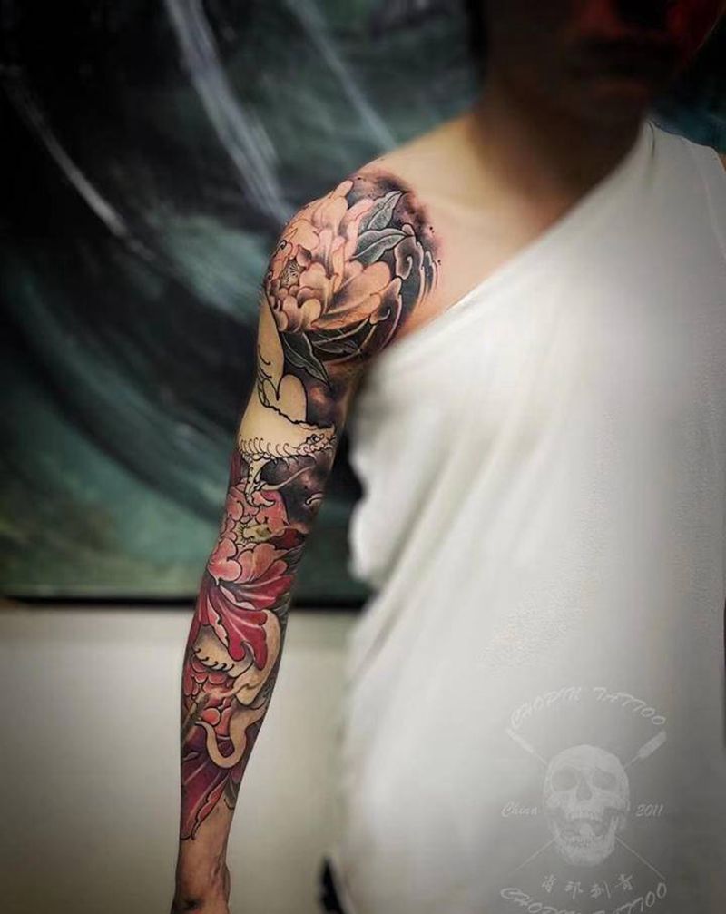 花臂未完待续纹身图片_手臂新传统纹身图案