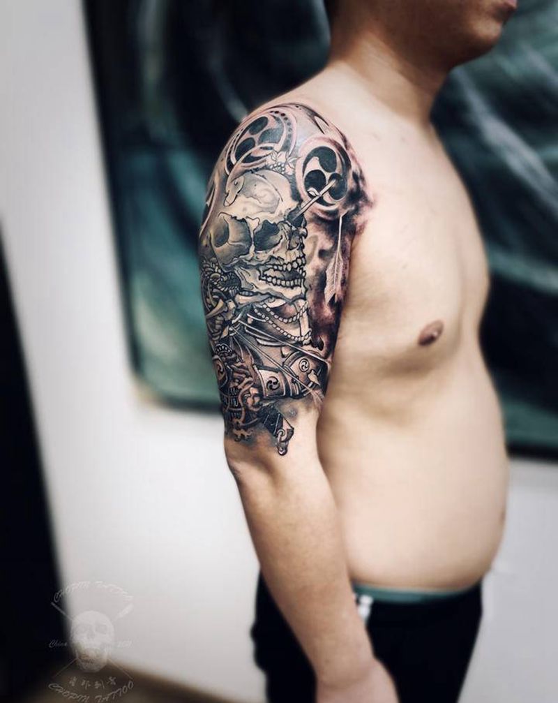 大臂骷髅纹身图片_手臂新传统纹身图案