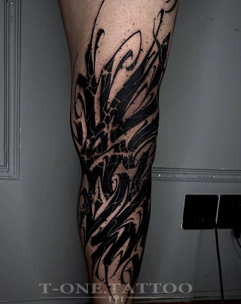 T-one纹身图片_腿部花体字纹身图案