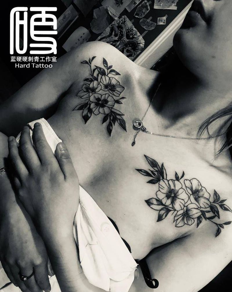 素花纹身图片_胸部纹身图案