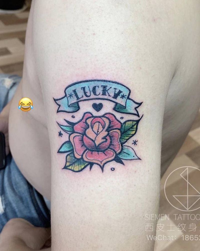 幸运属于你纹身图片_手臂Old School彩色花纹身图案