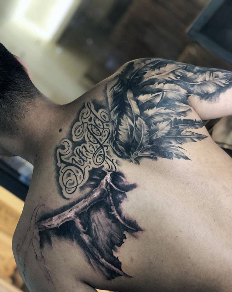 进度85%纹身图片_背部欧美写实花体字纹身图案