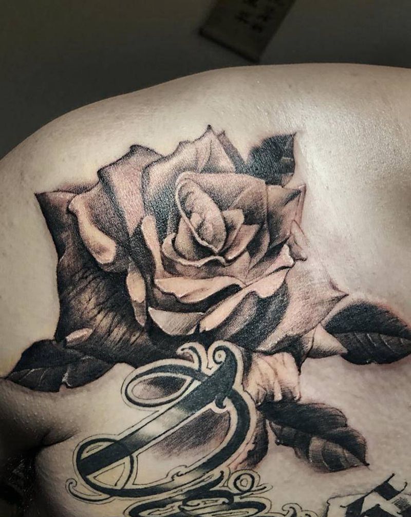 花胸接近完成进度85%纹身图片_胸部花体字欧美写实纹身图案