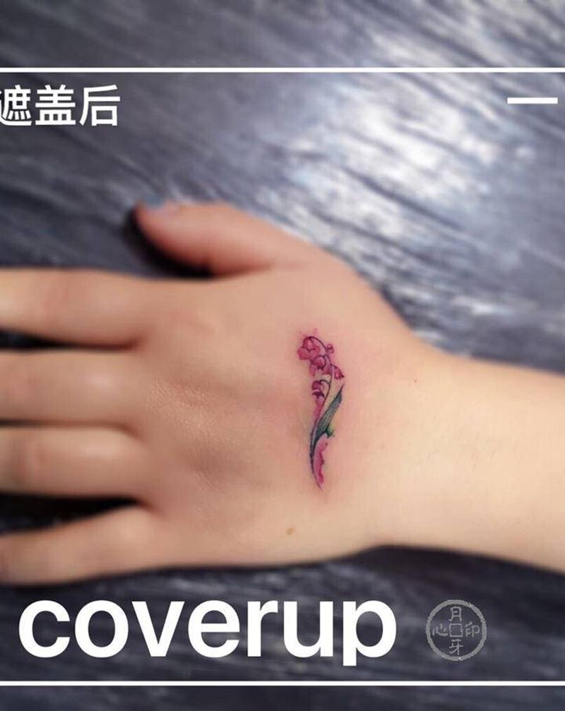 遮盖旧纹身和疤痕纹身图片_手部水彩遮盖花纹身图案