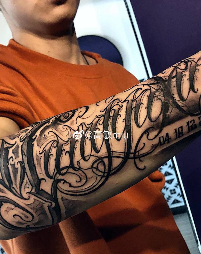 花体字纹身图片_手臂花体字纹身图案