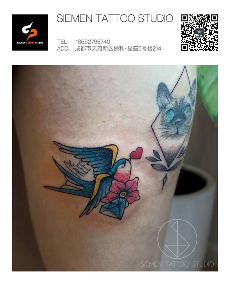 燕子纹身图片_腿部Old School水彩燕子纹身图案