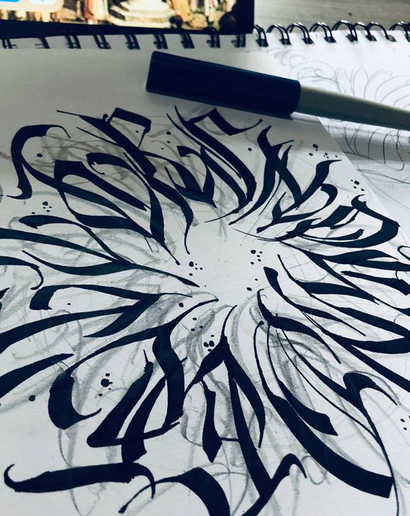 手稿纹身图片_手臂花体字纹身图案