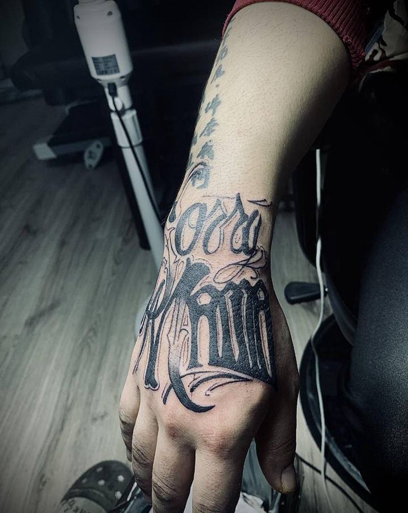 花体字纹身图片_手部纹身图案