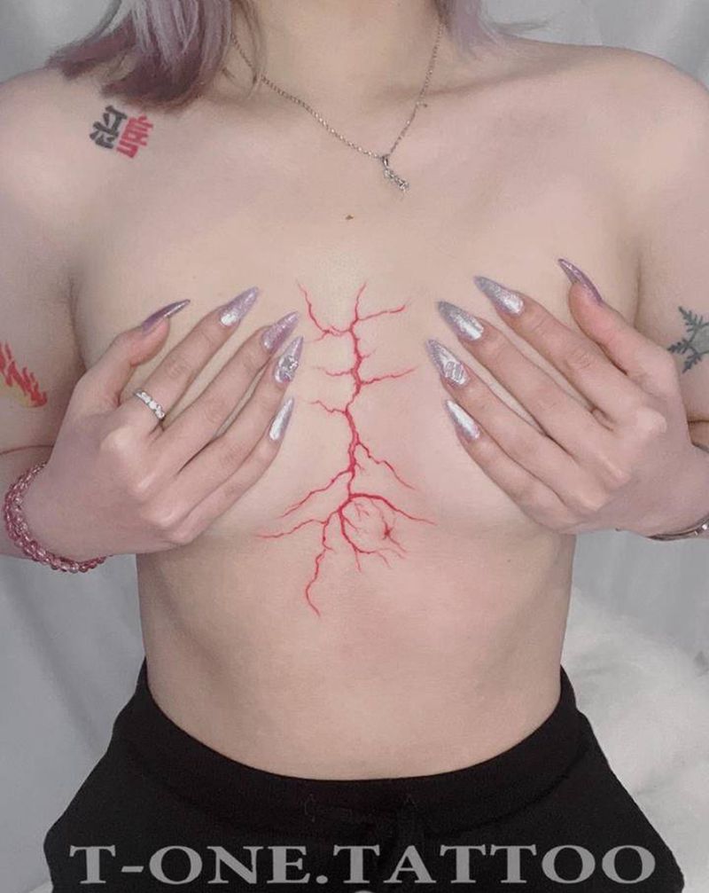T-one纹身图片_胸部纹身图案