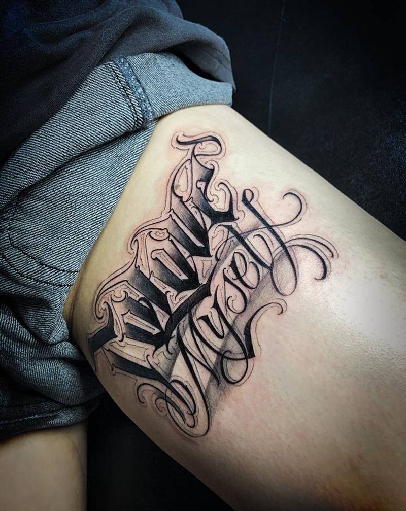 花体字纹身图片_腿部花体字欧美写实纹身图案