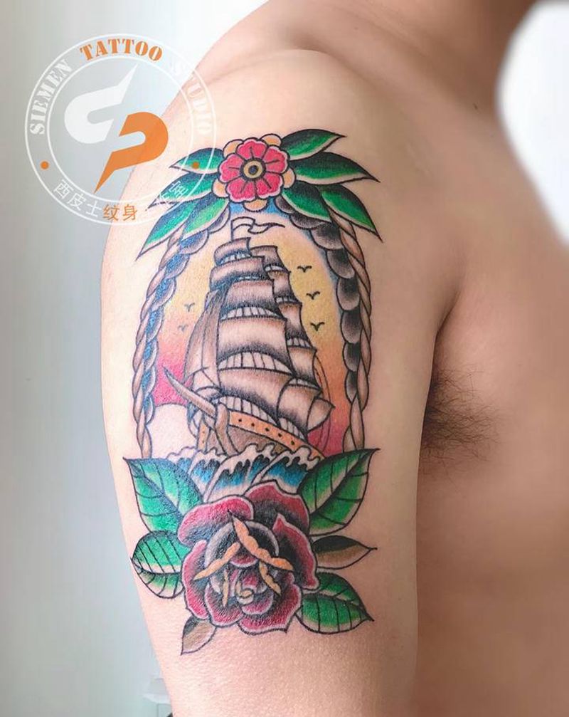 帆船纹身图片_手臂肩部Old School帆船玫瑰落日余晖纹身图案