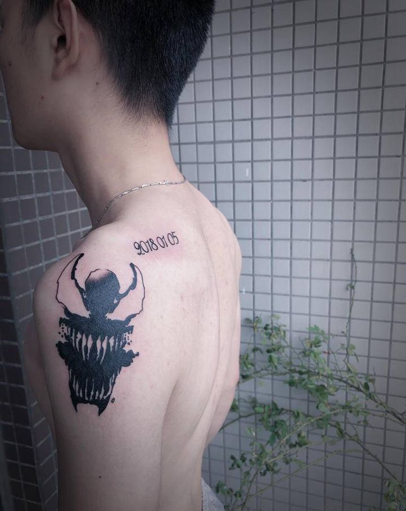 毒液纹身图片_手臂水墨纹身图案