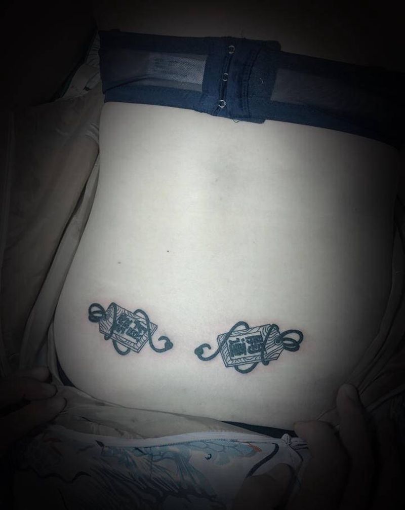 御守纹身图片_腰部老传统纹身图案