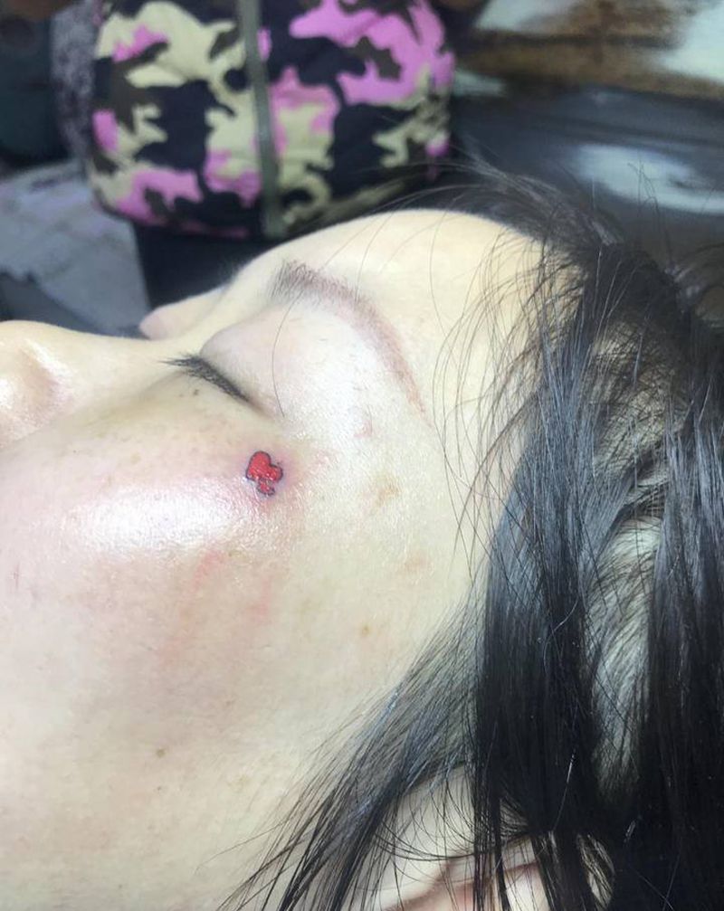 眼角遮盖胎记纹身图片_颈部纹身图案