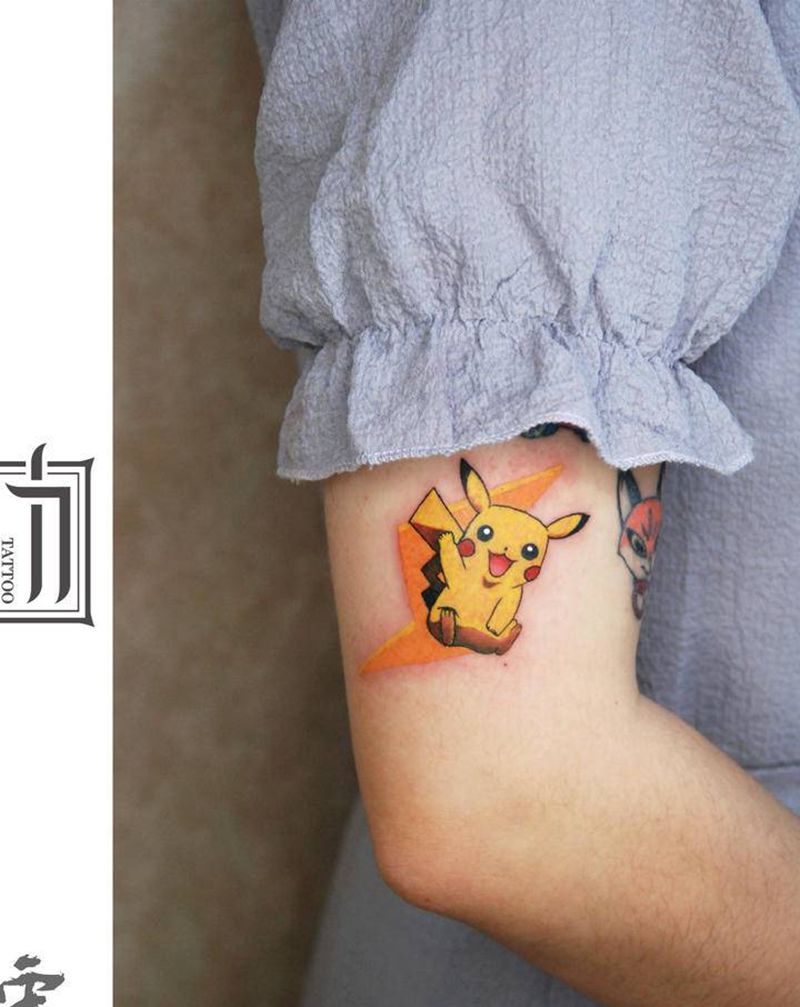 皮卡丘纹身图片_手臂卡通纹身图案