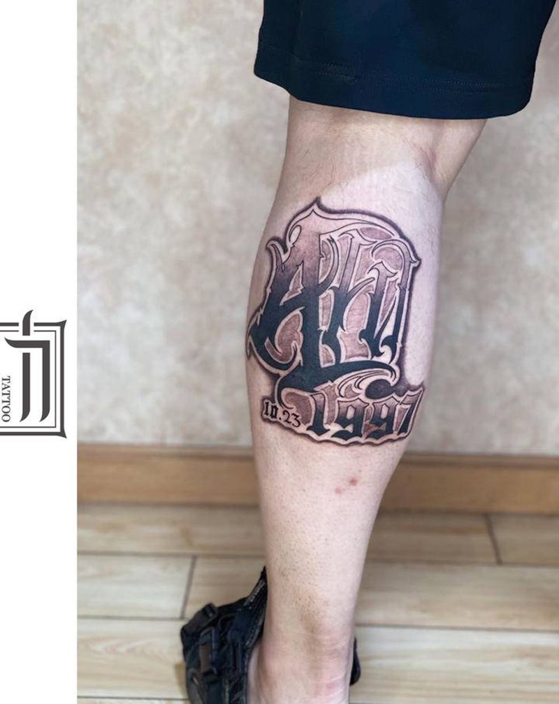 花体英文纹身图片_腿部花体字纹身图案