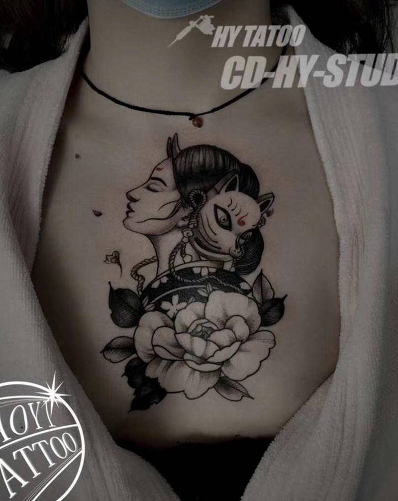 作品纹身图片_胸部纹身图案