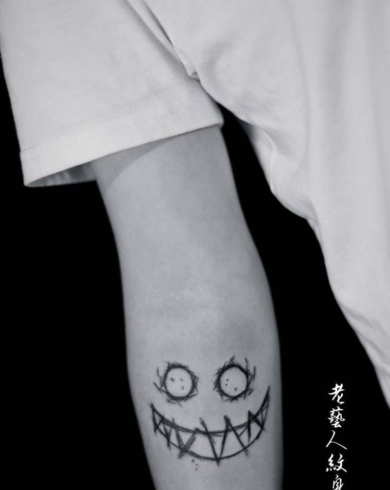 涂鸦纹身图片_手臂纹身图案
