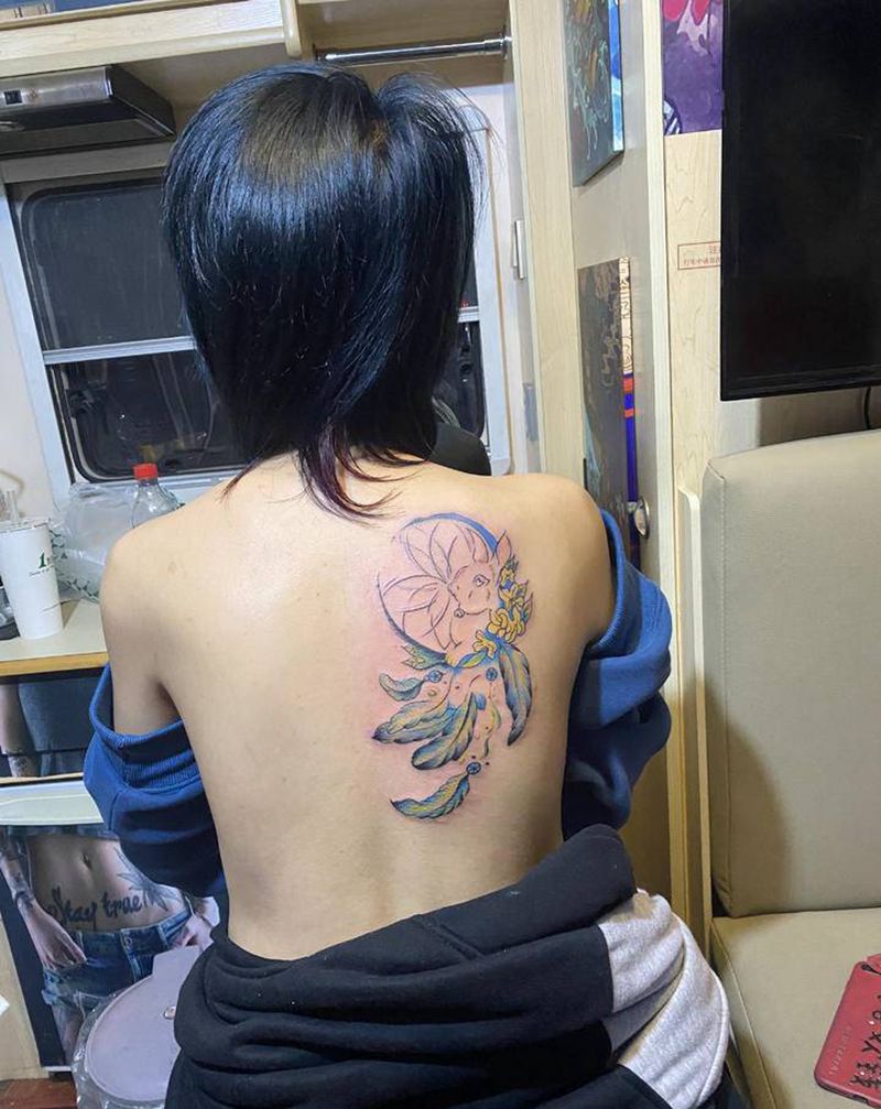 捕梦网纹身图片_背部纹身图案