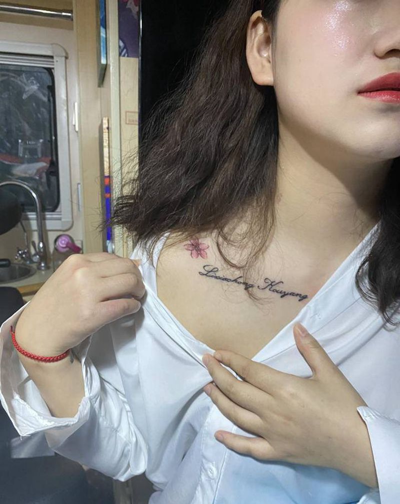 锁骨纹身图片_颈部纹身图案