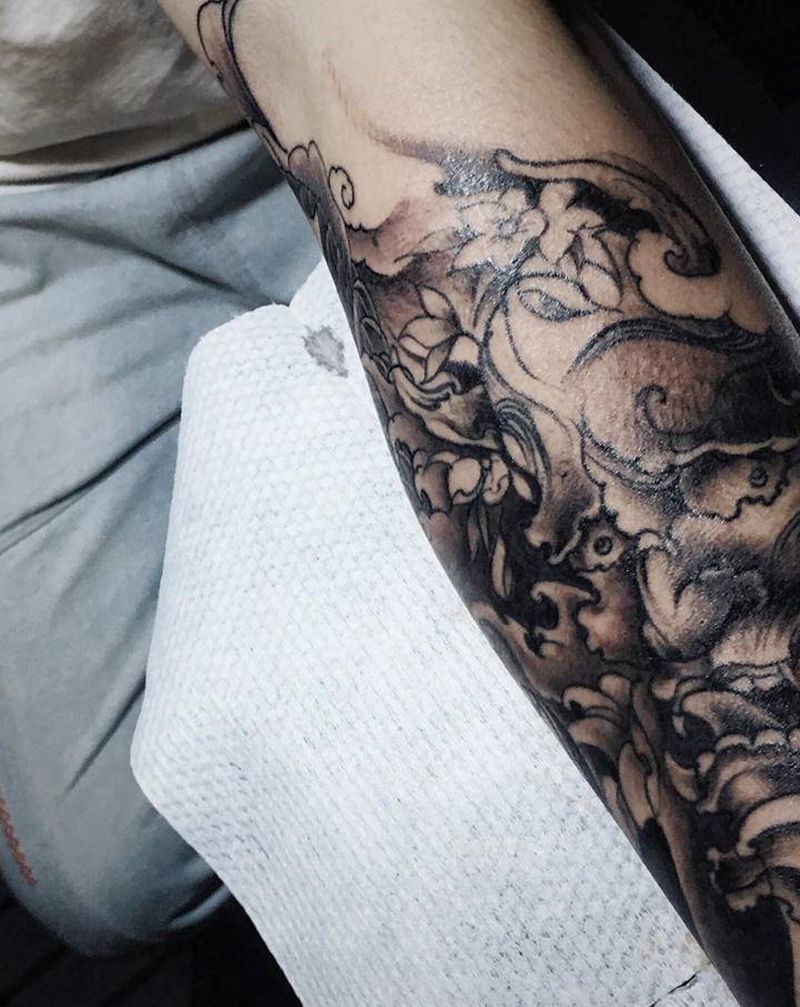 新传统花臂纹身图片_手臂新传统般若鱼花臂纹身图案