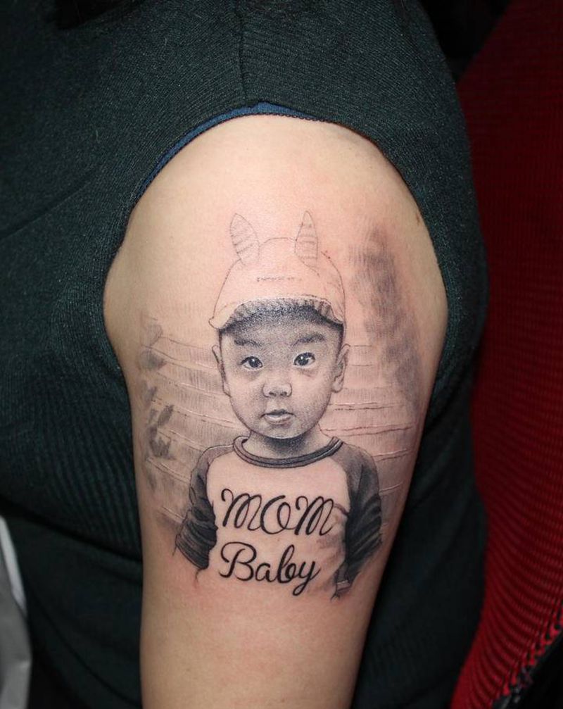 男孩纹身图片_手臂欧美写实New School肖像纹身图案