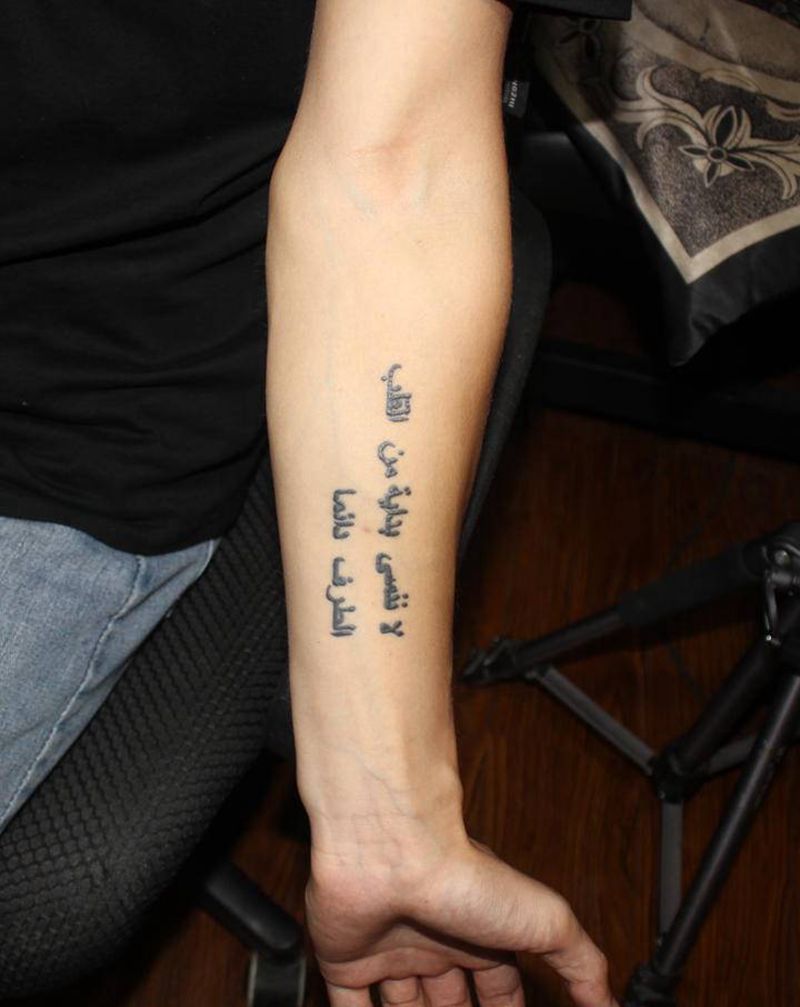 布偶兔遮盖纹身图片_手臂New SchoolOld School兔子玩偶纹身图案