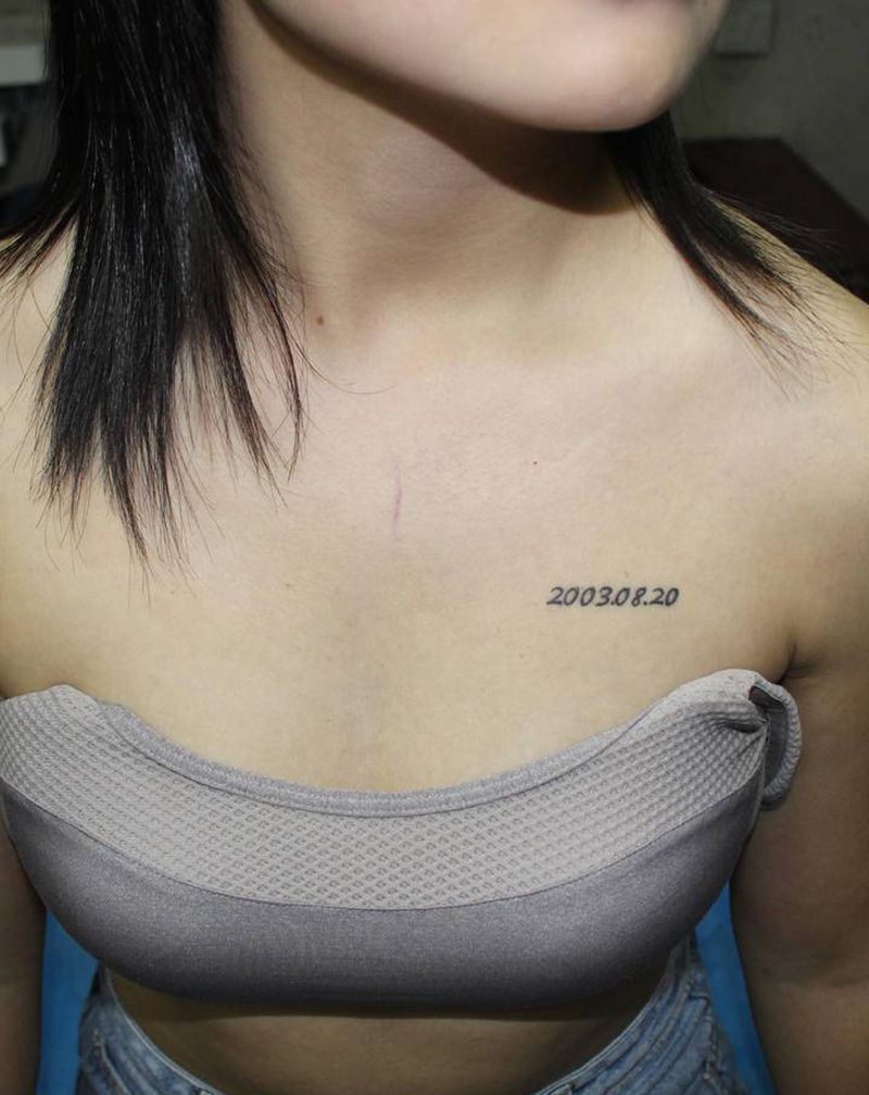 花体字花胸遮盖纹身图片_胸部花体字图腾花胸遮盖纹身图案