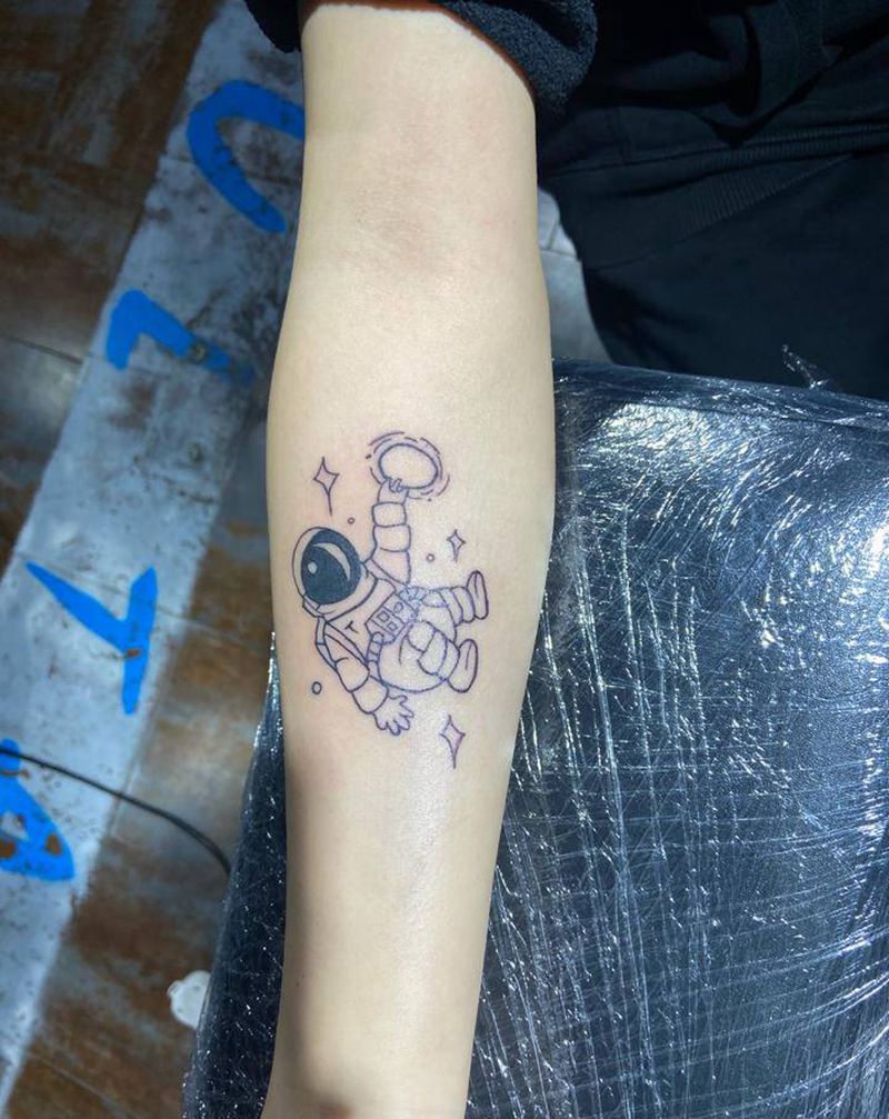 太空人纹身图片_手臂纹身图案