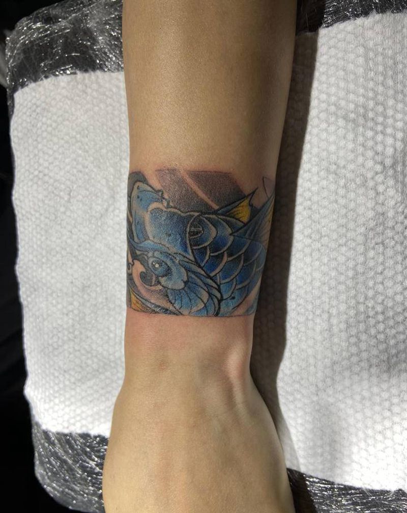 臂环纹身图片_手臂新传统鱼纹身图案