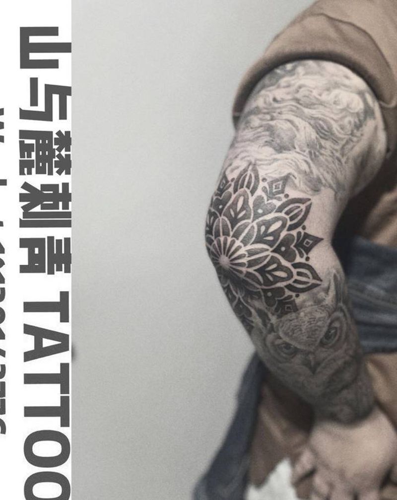 图腾爆肘纹身图片_手臂图腾爆肘图腾梵花纹身图案