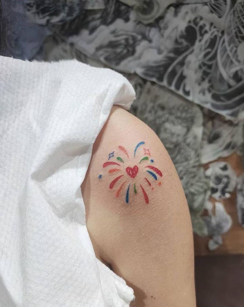 烟花纹身图片_手臂水彩纹身图案