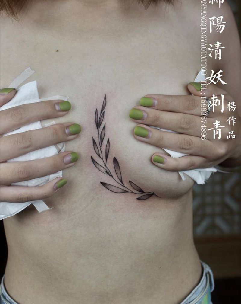 树叶纹身图片_胸部水彩纹身图案