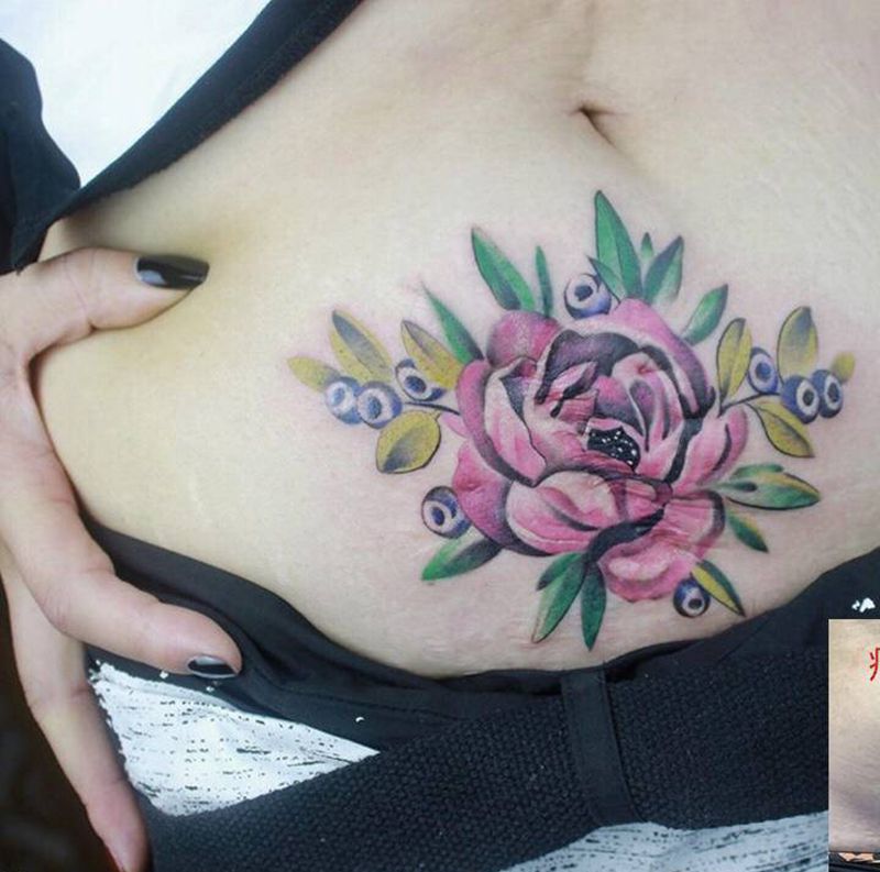 花纹身图片_腹部水彩纹身图案