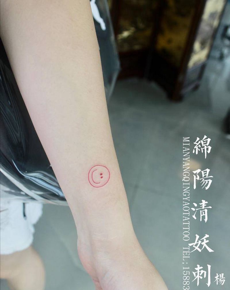 笑脸纹身图片_手臂水彩纹身图案