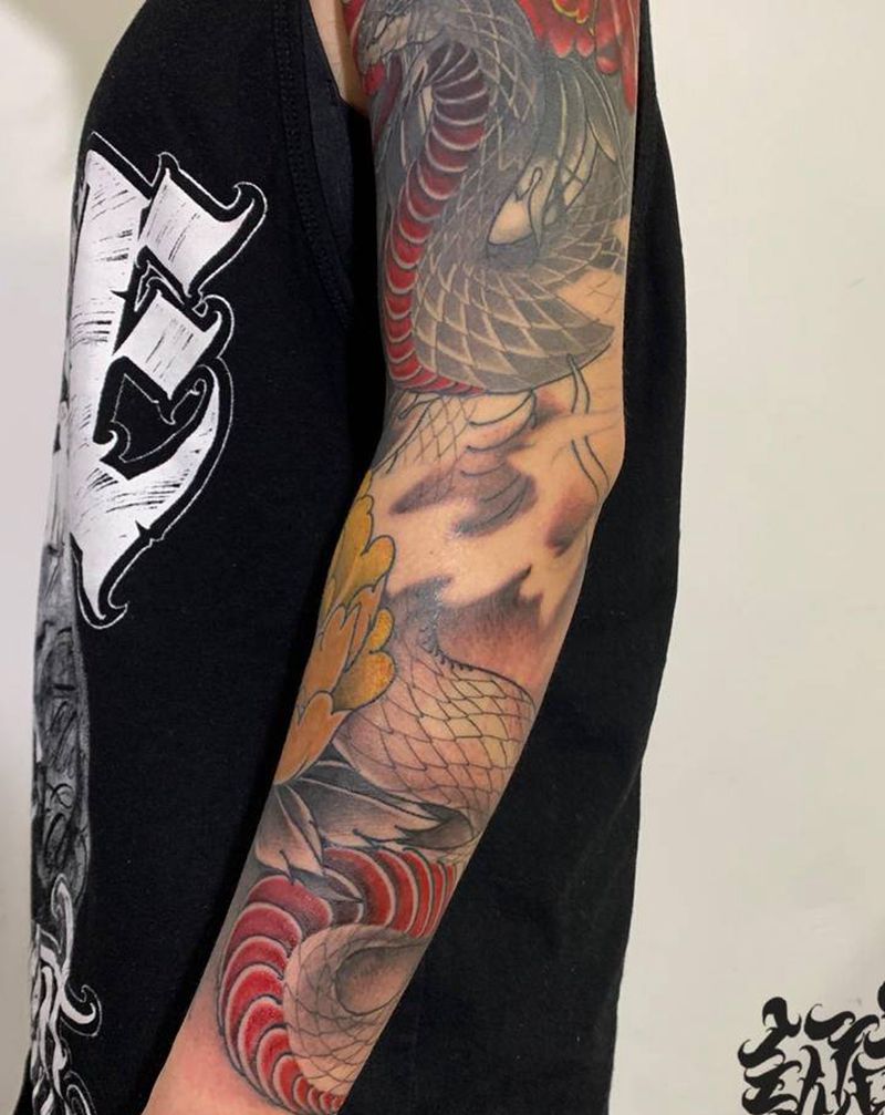 七分袖遮盖老纹身纹身图片_手臂新传统纹身图案