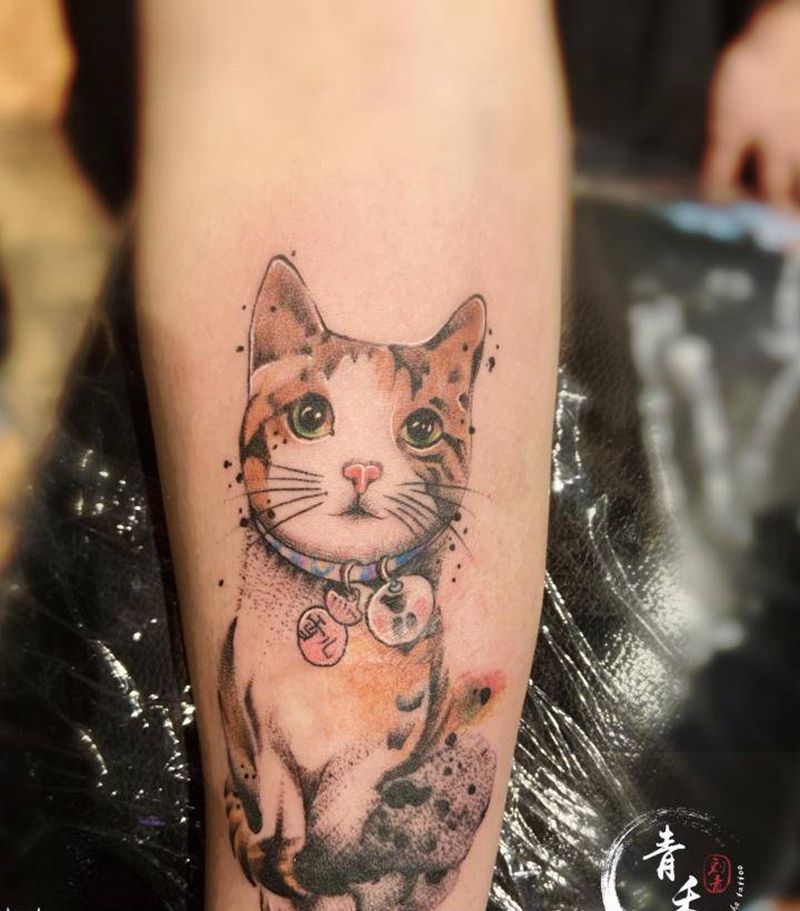 小猫纹身图片_手臂纹身图案