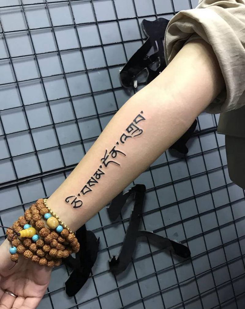 藏文纹身图片_手臂纹身图案