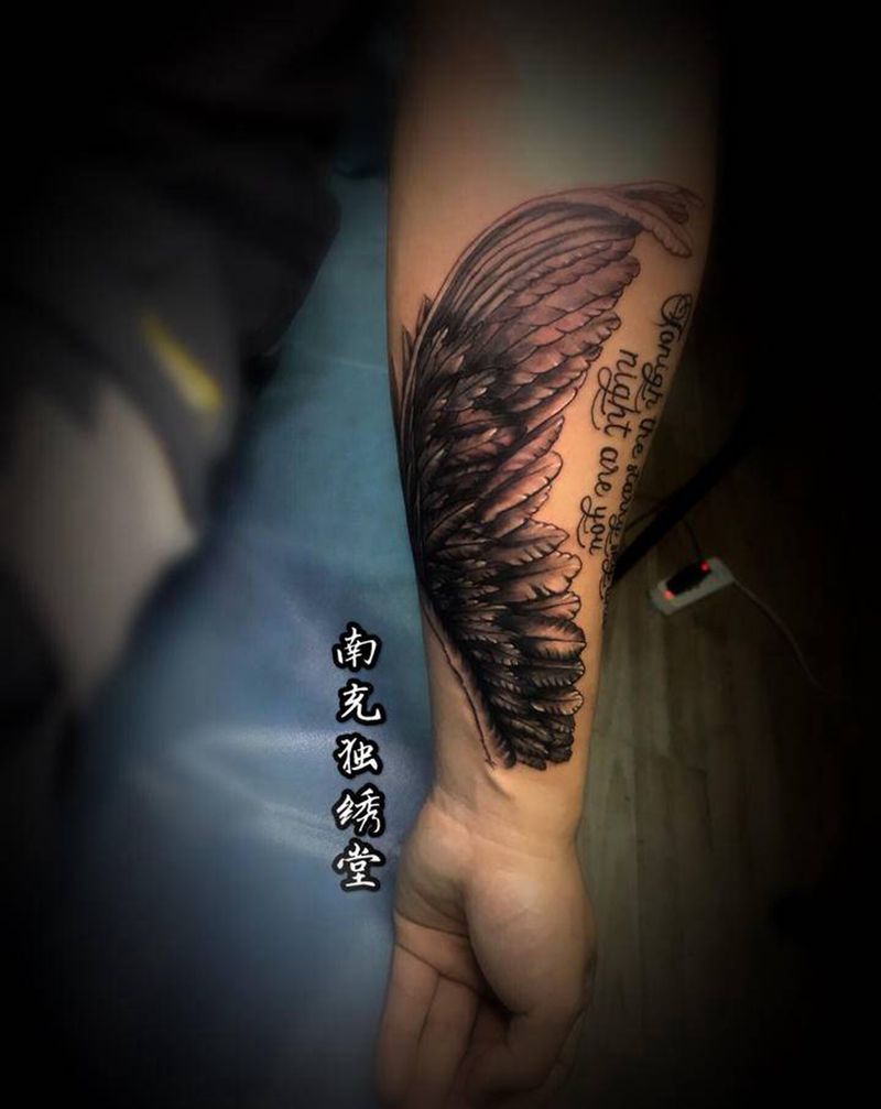 翅膀纹身图片_手臂纹身图案