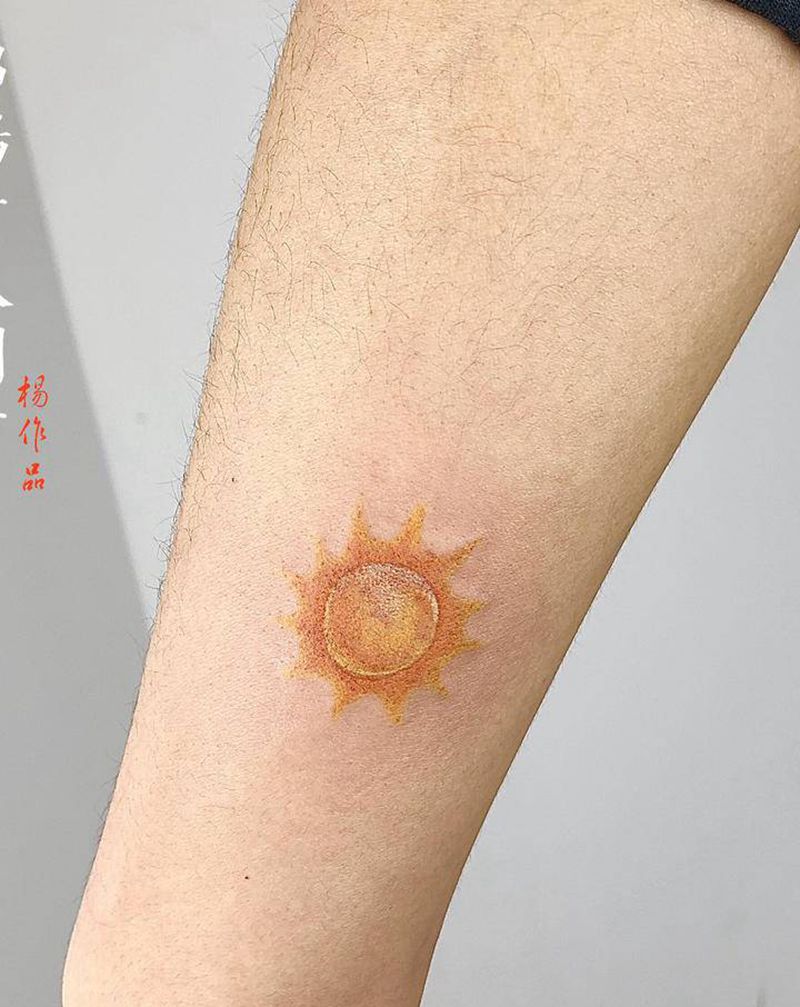 小臂太阳纹身图片_胸部肩部纹身图案