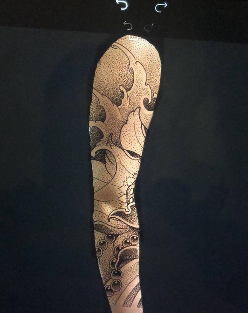 浪臂纹身图片_手臂纹身图案